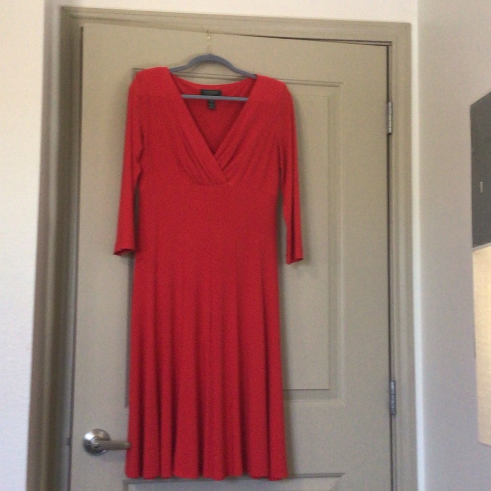 Ralph Lauren Red mid sleeve swing dress. Falls below the knee.